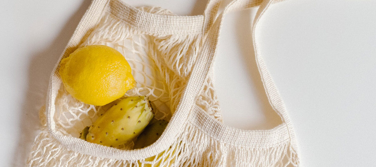 string shopper back containing fruit